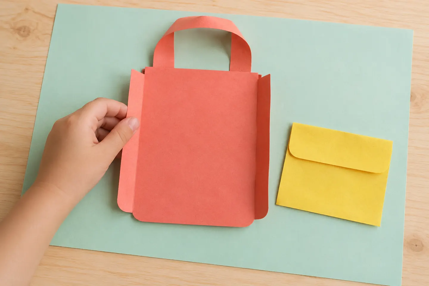 Positioning the backpack body and handle before adding the pocket.