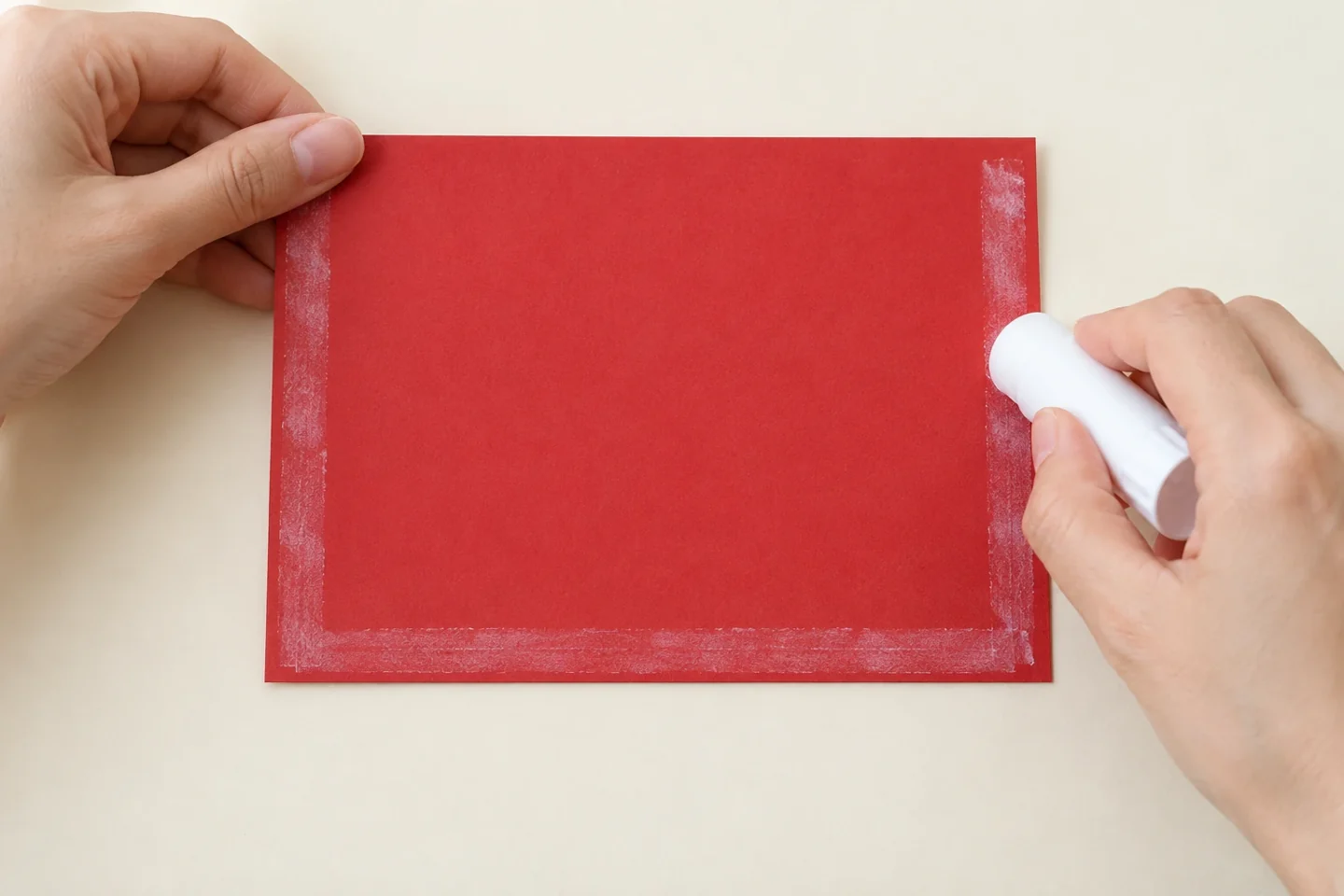 Apply glue-stick adhesive to the two sides and bottom, leaving the top edge clear.