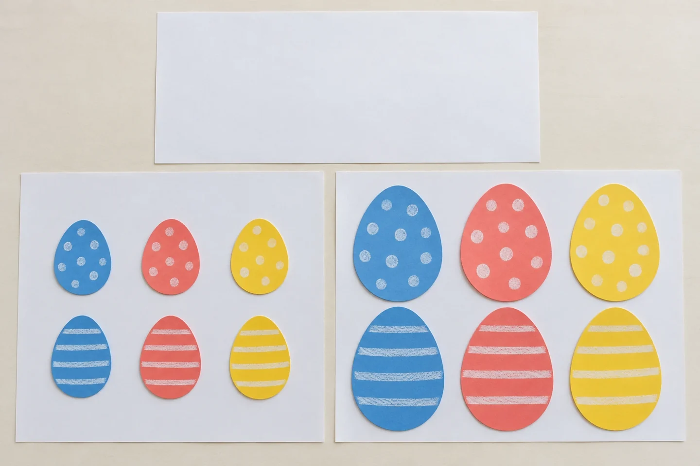 six 4-inch eggs on one mat and six 6-inch eggs on another, third mat empty